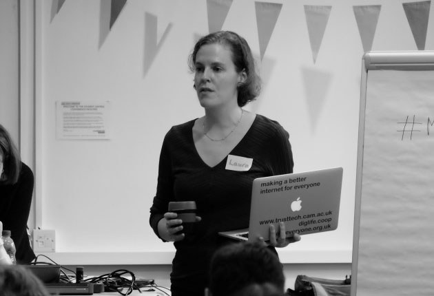 Laura James holding a laptop at the 2018 Festival of Maintenance